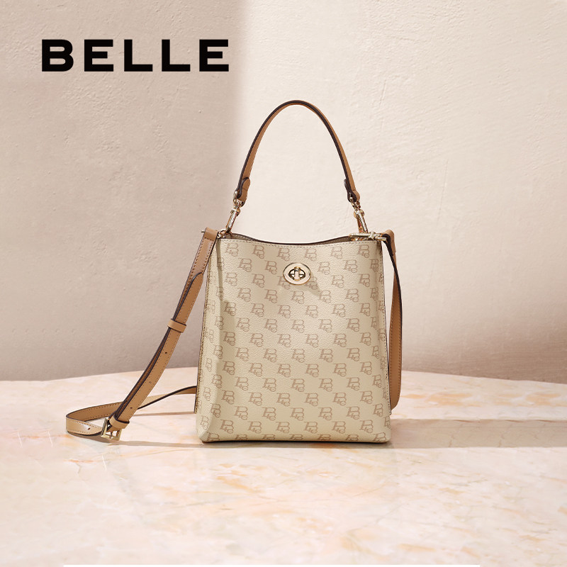 百丽包包女大容量春新款复古通勤休闲单肩斜挎手提水桶包X7191AX5,淘宝优惠券,粉丝福利购,淘宝优惠卷