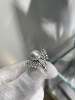 A two-wear ring that can be worn daily or for flamboyance. 10.64mm Australian white set with 18k natural diamonds. Dazzling.