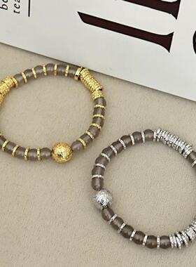 烟灰色冰透灰码碯黄金色手串锤纹