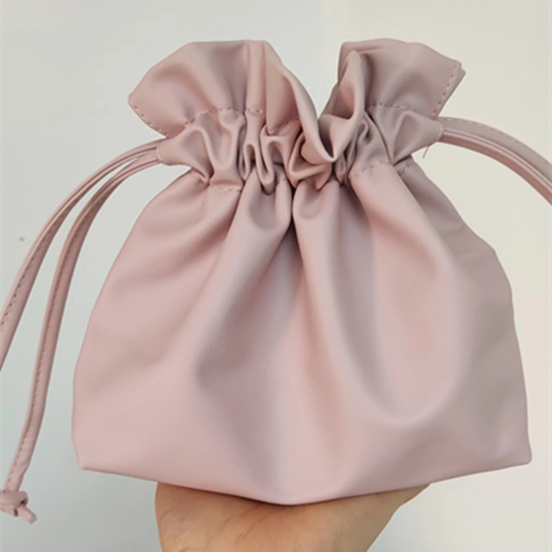 包邮3CE化妆包韩国粉色抽绳收纳包内衣旅行云朵包女洗漱包手机包