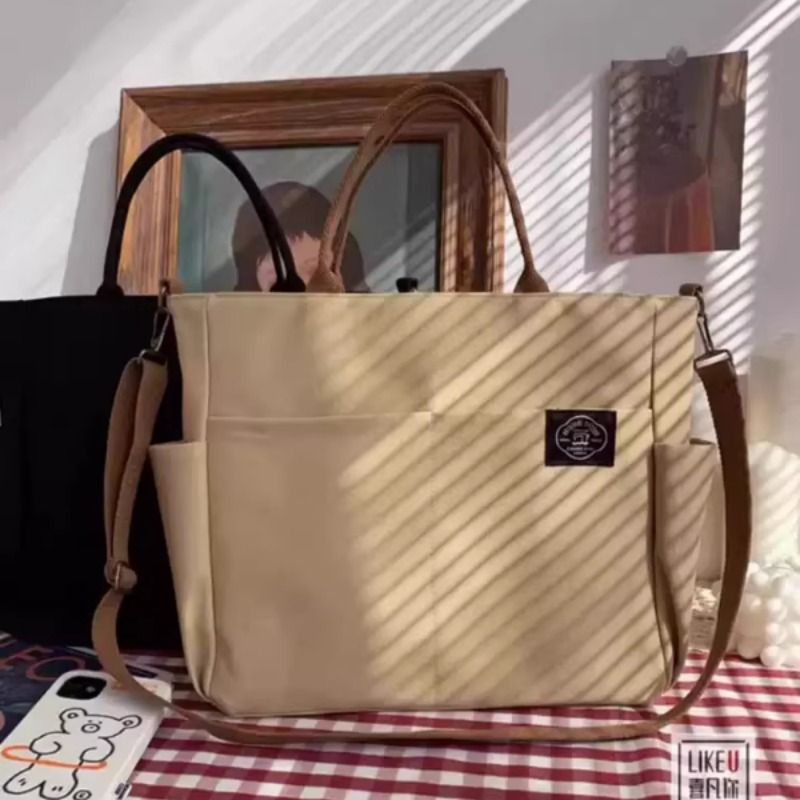 加厚多口袋文艺托特帆布学生电脑简约手提单肩斜挎包2025隔层可放 - 图2