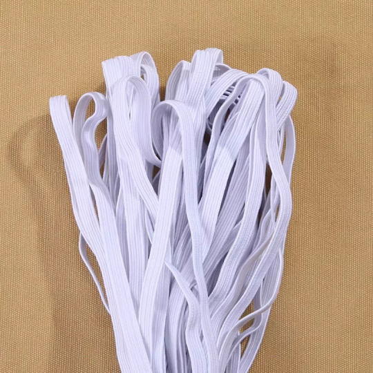 Cuerda elástica de goma elástica blanca.