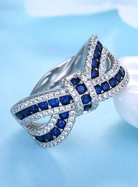 韩版蝴蝶结钻戒女s925银镶嵌红宝石不规则条形交叉戒指丝带指环