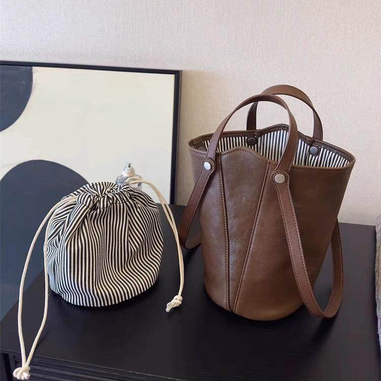 韩版新款高级感复古软皮轻奢小众托特包通勤大容量旅行通用百搭包,淘宝优惠券,粉丝福利购,淘宝优惠卷