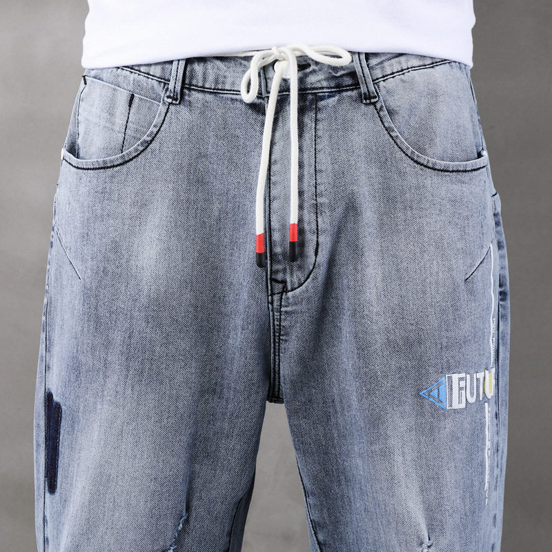 夏天高中学生九八分帅气破洞牛仔裤 宾朗图牛仔裤