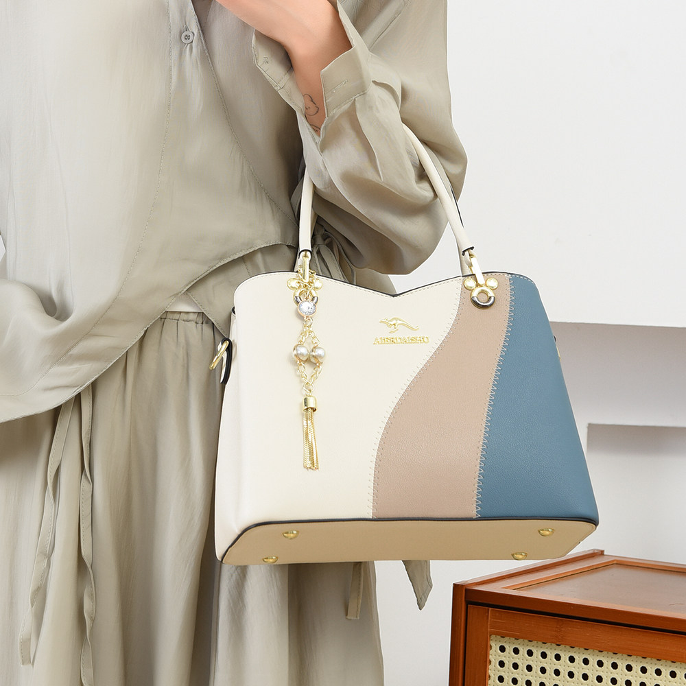 品牌袋鼠女包2025新款时尚大气单肩斜挎包大容量真皮手提包送妈妈,淘宝优惠券,粉丝福利购,淘宝优惠卷