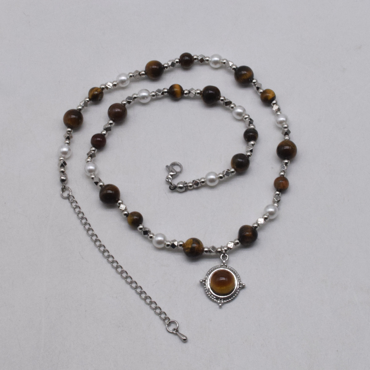 复古美拉德虎眼石吊坠项链轻奢简约颈链毛衣链长款小众设计锁骨链,淘宝优惠券,粉丝福利购,淘宝优惠卷