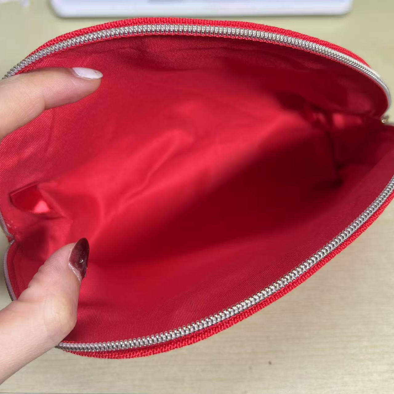 资生堂新款喜庆手拿包厚实帆布收纳包化妆包贝壳型,淘宝优惠券,粉丝福利购,淘宝优惠卷