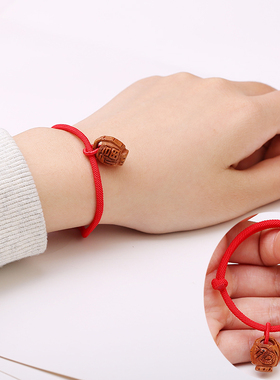 小孩子红绳野生桃核本命年蛇手链