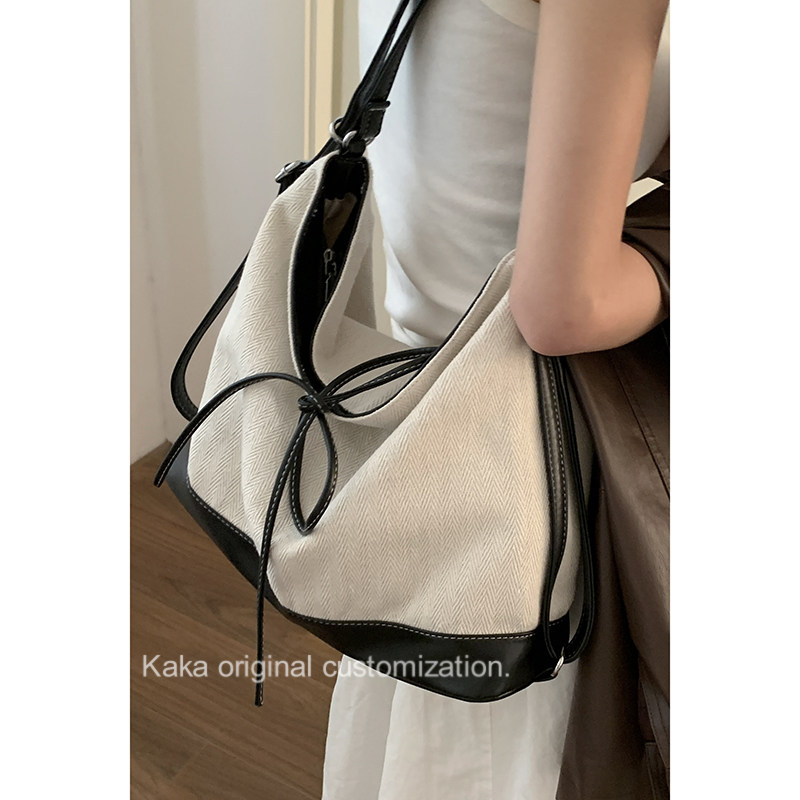 韩国大容量帆布包包女2025新款潮学院托特包休闲单肩水桶包旅行包,淘宝优惠券,粉丝福利购,淘宝优惠卷