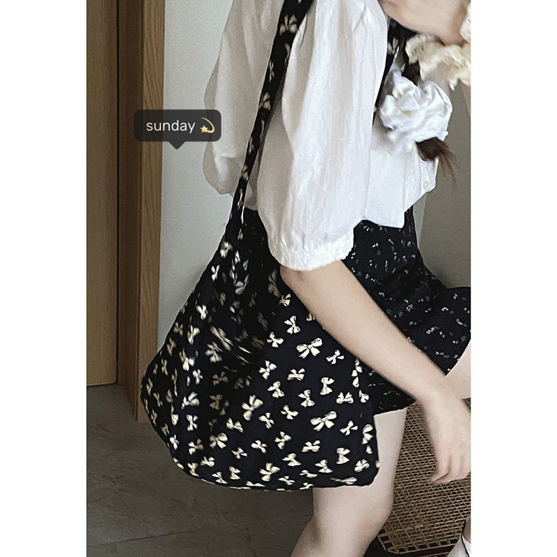 章若楠同款碎花帆布包包女夏天2025新款潮韩国托特包大容量水桶包,淘宝优惠券,粉丝福利购,淘宝优惠卷