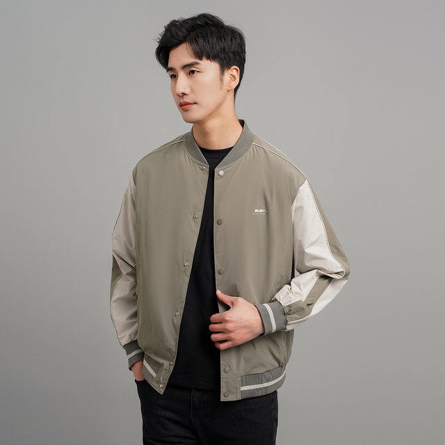 American retro handsome baseball uniform jacket flying in the snow