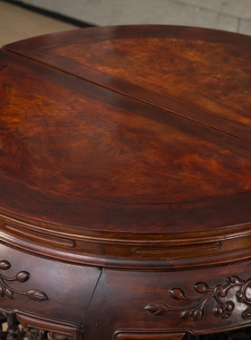 红木镶瘿木雕花果纹双拼圆桌