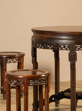 清代红木透雕绳纹圆桌圆凳成套