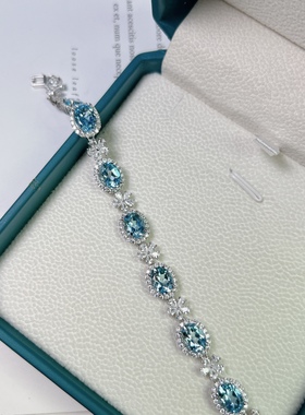 星赞轻奢珠宝轻奢S925银镶嵌约10克拉天然伦敦蓝托帕石椭圆形手链