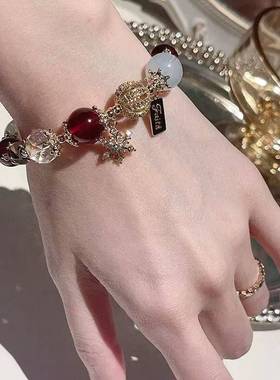 ins圣诞冬雪花仿天然酒红石榴红蛋白石手链手串礼物学生琉璃手链