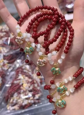 新款仿朱砂色猫眼摇摇木马手链高级感学生手串女生红琉璃手链礼物