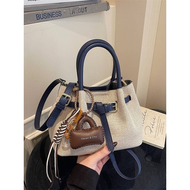 专柜品牌秋冬复古手提水桶小包包流行单肩包2025新款时尚百搭通勤,淘宝优惠券,粉丝福利购,淘宝优惠卷