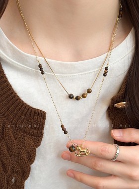 复古虎眼石小马项链女2025新款轻奢小众毛衣链秋冬长款本命年配饰