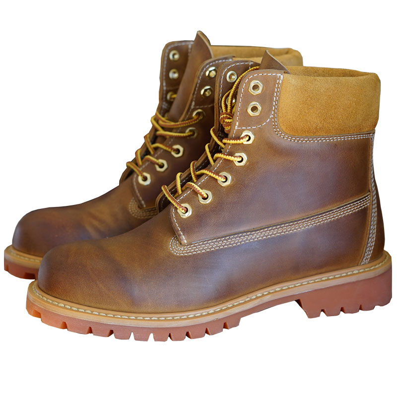 Elegant golden Chelsea boots