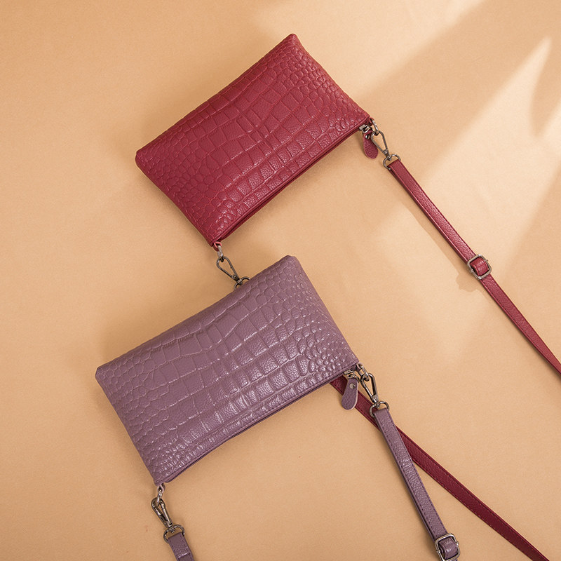 姿狄真皮手拿包女2020新款斜挎包 姿狄女士包袋