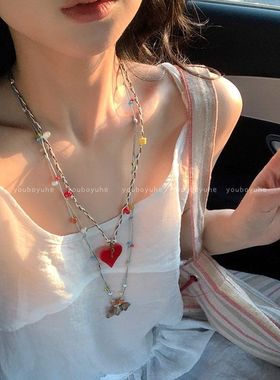 进口卡通陶瓷小狗串珠吊坠项链女多巴胺彩色长款可调节卫衣链百