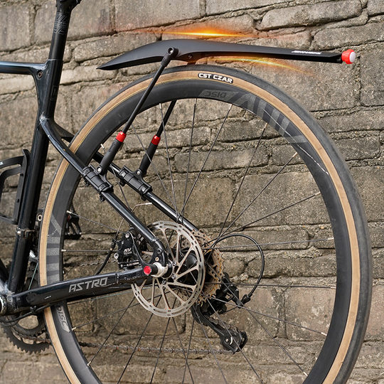 Bicycle fenders are stable and extended to block water and prevent tire wear