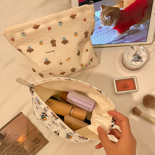 可爱小清新手拿化妆包女便携式大容量旅行收纳袋随身护肤品洗漱包