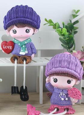 The creative romantic couple hangs their feet on the table.