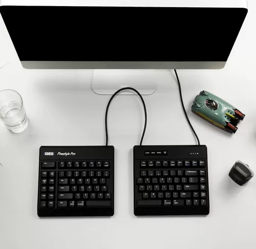 Kinesis Freestyle Pro разделил механический клавиативный чайный вал Красный вал.