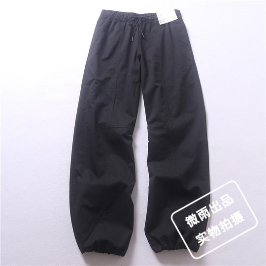 El seguro de envío está incluido y hay fotos reales de pantalones de mujer de primavera y otoño.