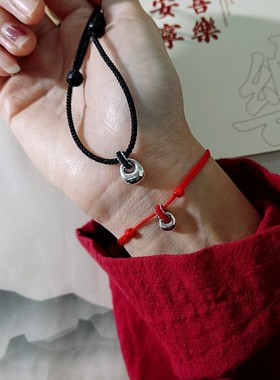 925亮银小福袋编织红手绳