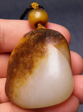 黑皮黄沁白玉独籽料生肖虎手把件