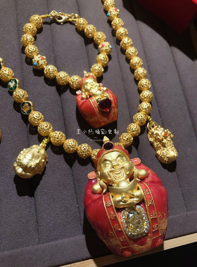 鸽血红财神爷手链999足金
