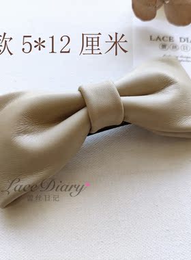 蕾丝日记羊皮森女系通勤职业蝴蝶
