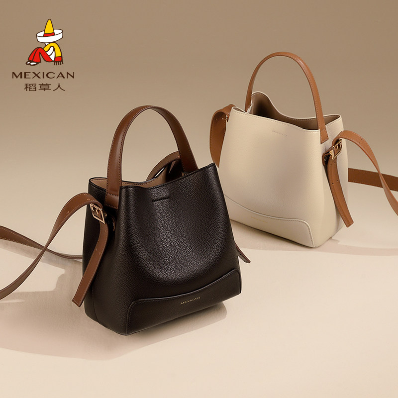 稻草人女士今年流行高级感水桶包 稻草人箱包女士包袋