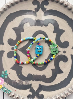 孤注一掷孙阳同款可爱陶瓷怪兽丑脸彩色弹力弹力手链手绳情侣男女