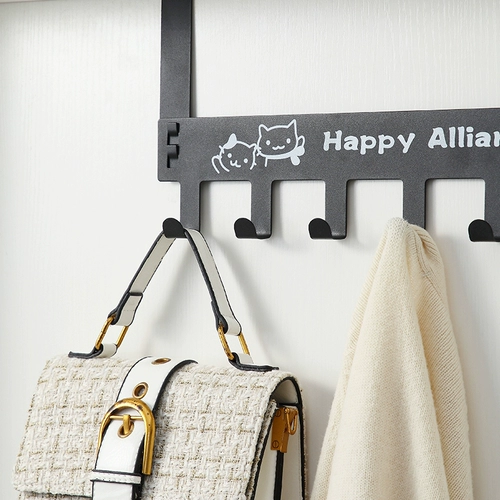 Крюк -крюк крючков крючков за дверью висит вешалку, висящую на двери, и висят крюк за дверью за дверью спальни