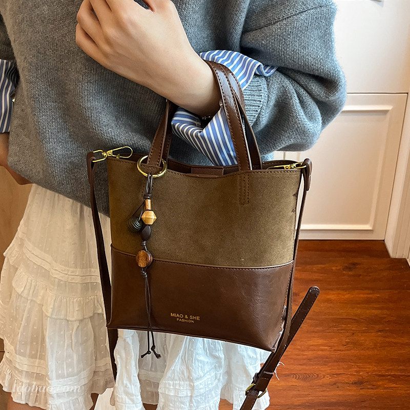 复古撞色拼接小包包女2025新款时尚百搭斜挎包精致超火手提水桶包,淘宝优惠券,粉丝福利购,淘宝优惠卷
