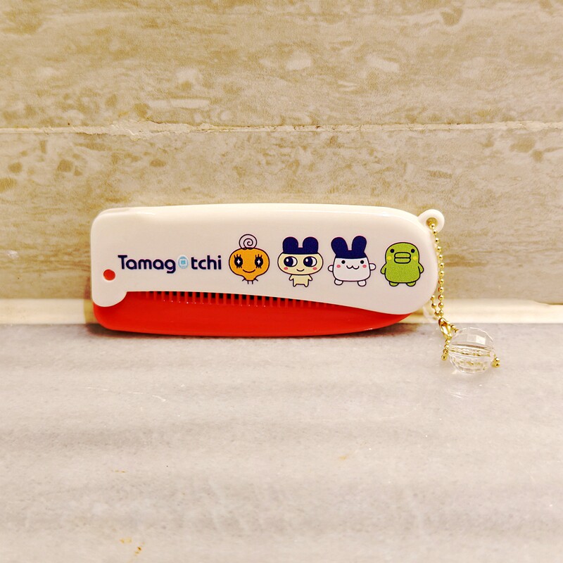 日本拓麻歌子tamagotchi电子宠物便携折叠梳子刘海梳挂件闪片随身,淘宝优惠券,粉丝福利购,淘宝优惠卷