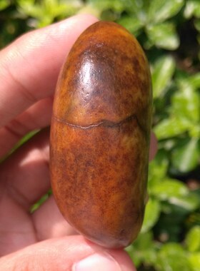 新疆和田玉黄沁籽料原石手把件
