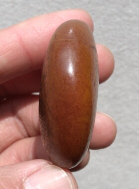 和田玉籽料原石洒红皮独籽手把件