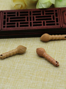 肥城文昌塔儿童状元笔桃木雕刻
