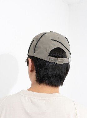 HELIOTEMIL绑带设计弯檐鸭舌帽