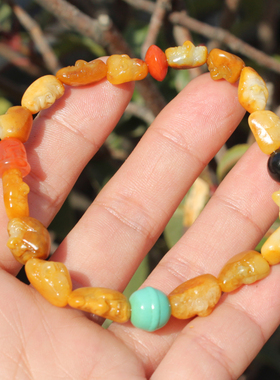 新疆老熟黄沁金包银籽料独籽手串