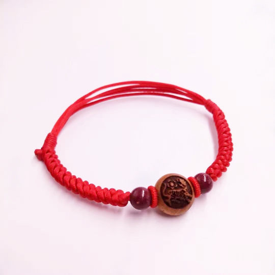 Peach wood zodiac cinnabar ankle chain