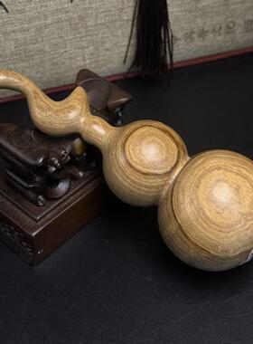 海南木王水垒奶香木精品手把件葫芦  高14cm宽4cm  重量为69 g