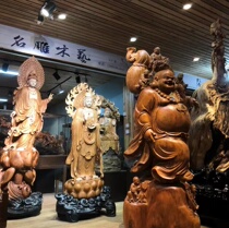 Large wood sculpted Millover statue of solid wood root sculpture dedicated to the living room pendulum and the statue of Guanyin Guanyin Red Office Statue