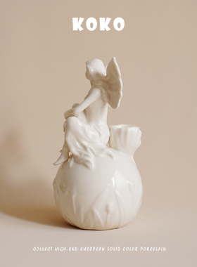 浮雕花仙子造型烛台陶瓷