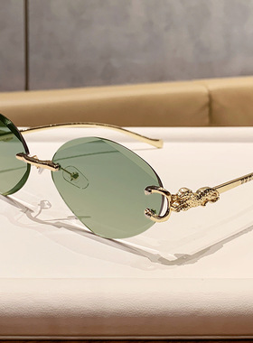 女潮小香儿金属无框椭圆墨镜